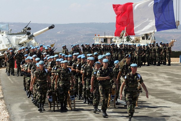 French soldiers from the United Nations Interim Forces in Lebanon (UNIFIL) take part in a medal parade held ahead of next week's troop rotation at their base in the sourthern Lebanese town of Tireh, near the border with Israel, on September 15, 2009. With a 1,600-strong force of "blue helmets", France is the second largest contributor to UNIFIL, beefed up after the UN-brokered truce between Lebanon and Hezbollah took effect in August 2006. According to a UNIFIL statement released on September 15, 2009, France has lost 28 soldiers during service in Lebanon since it started sending peacekeeping troops to the east Mediterranean country in 1978. AFP PHOTO/MAHMOUD ZAYAT (Photo credit should read MAHMOUD ZAYAT/AFP/Getty Images)